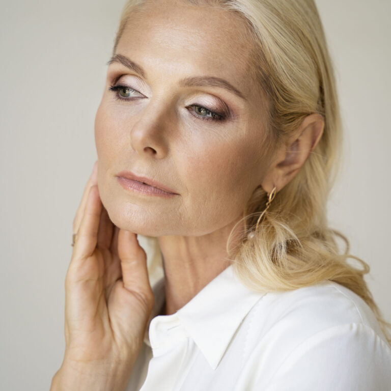 portrait-middle-aged-blonde-rich-woman